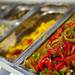 A row of pizza toppings are arranged at NeoPapalis on Tuesday. Daniel Brenner I AnnArbor.com